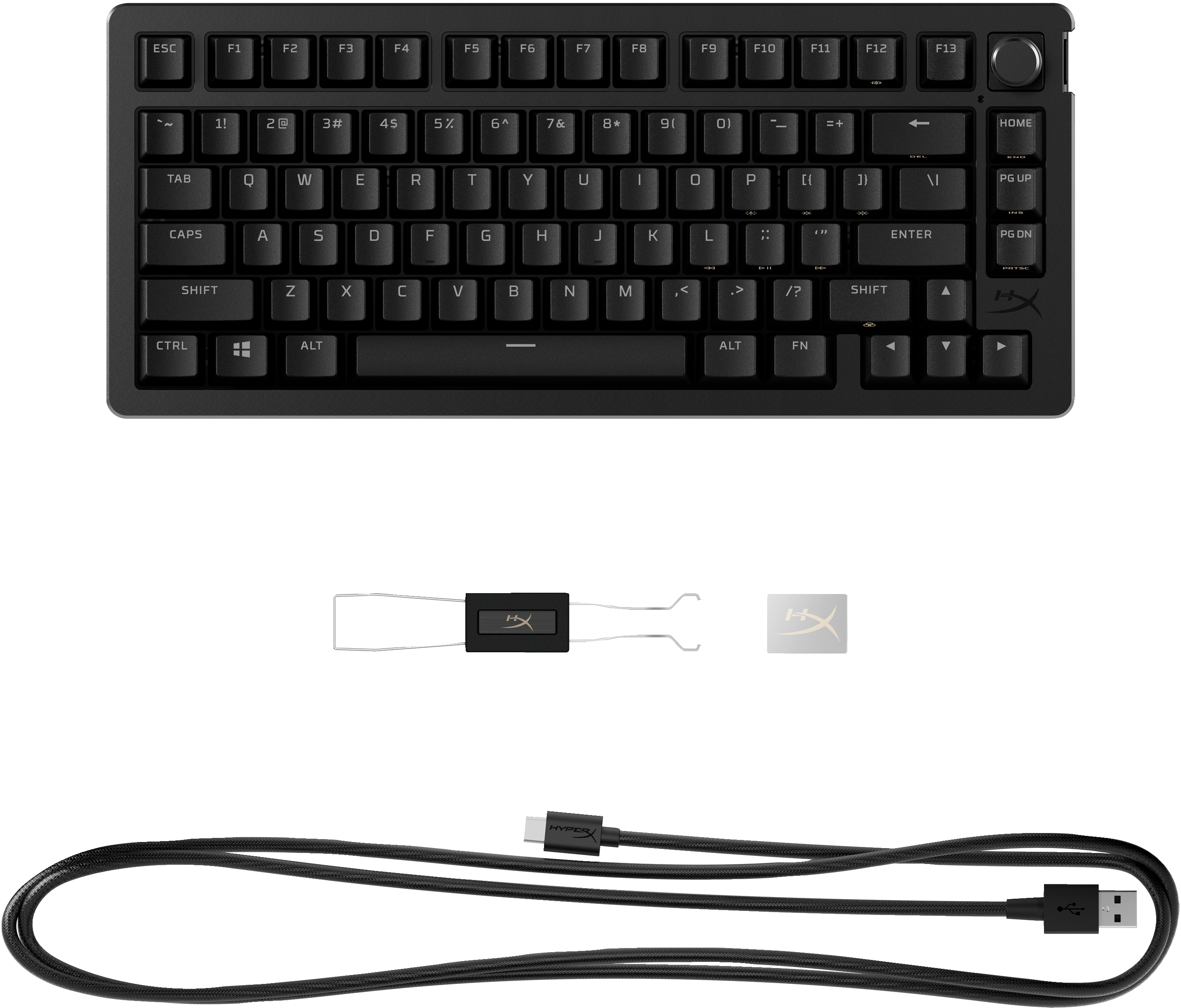 Black keyboard with white lettering, a keycap puller, and a USB cable.