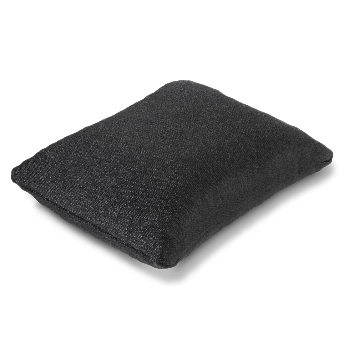 Un cojín rectangular negro sobre una superficie blanca. Tiene una superficie texturizada.