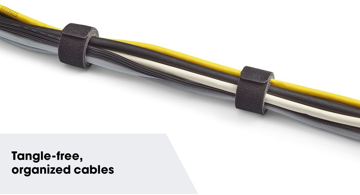 Kabel mit Klettbändern zusammengehalten. Gelbe, schwarze und graue Kabel sichtbar.