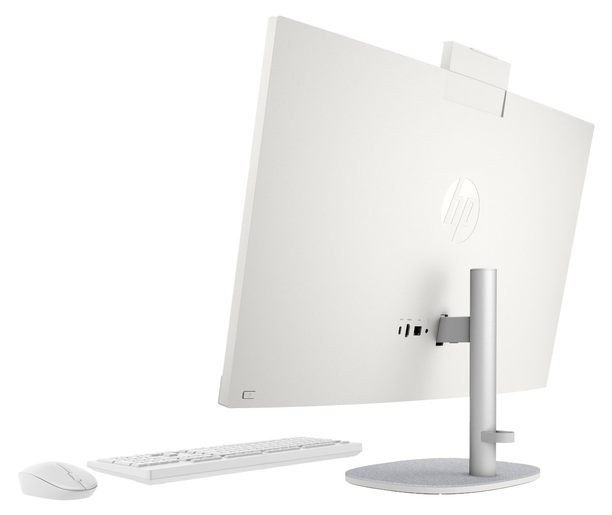 Biały komputer All-in-one, klawiatura i mysz. Widoczny jest tył komputera.