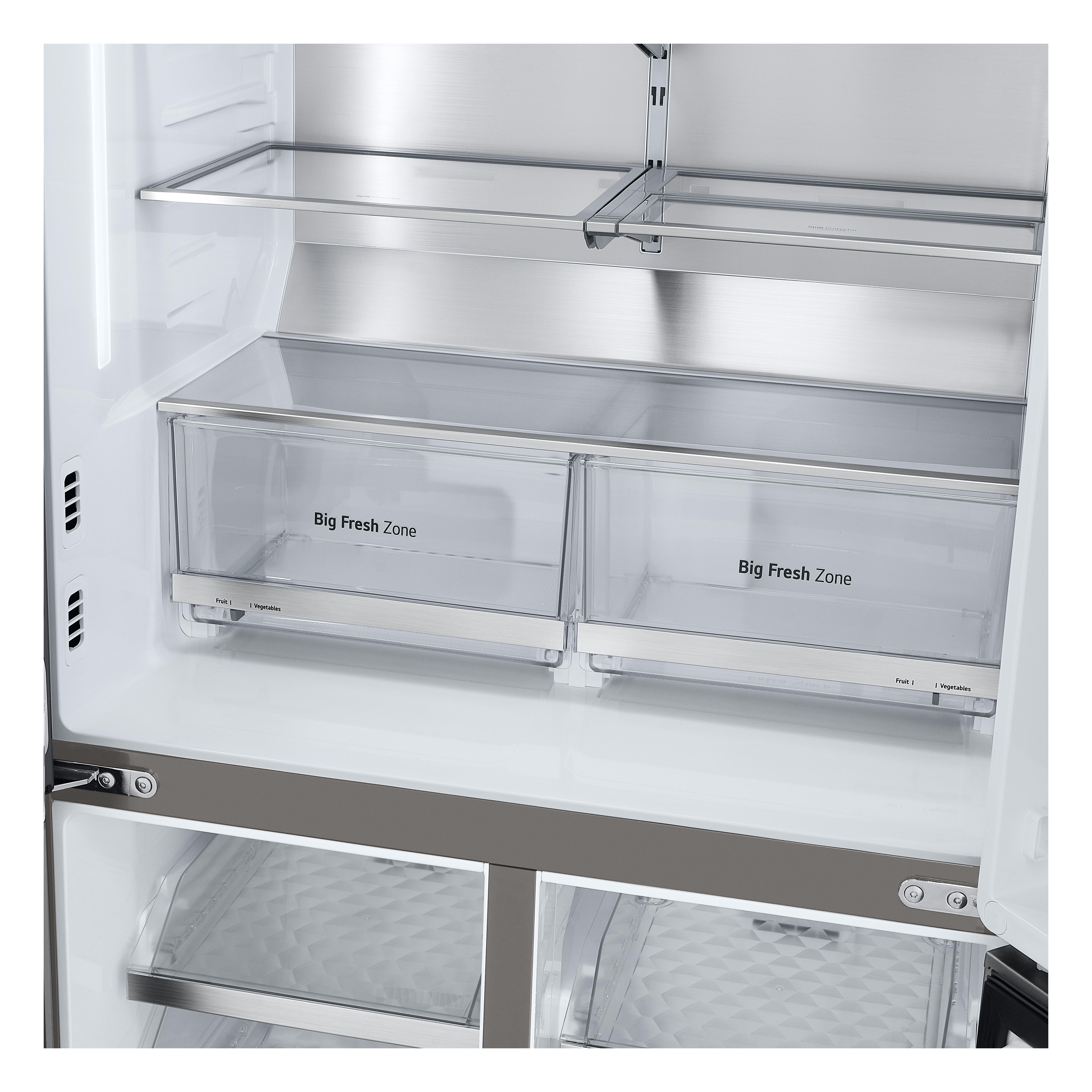 Ein offener Kühlschrank mit Schubladen. Auf den Schubladen steht „Big Fresh Zone“.