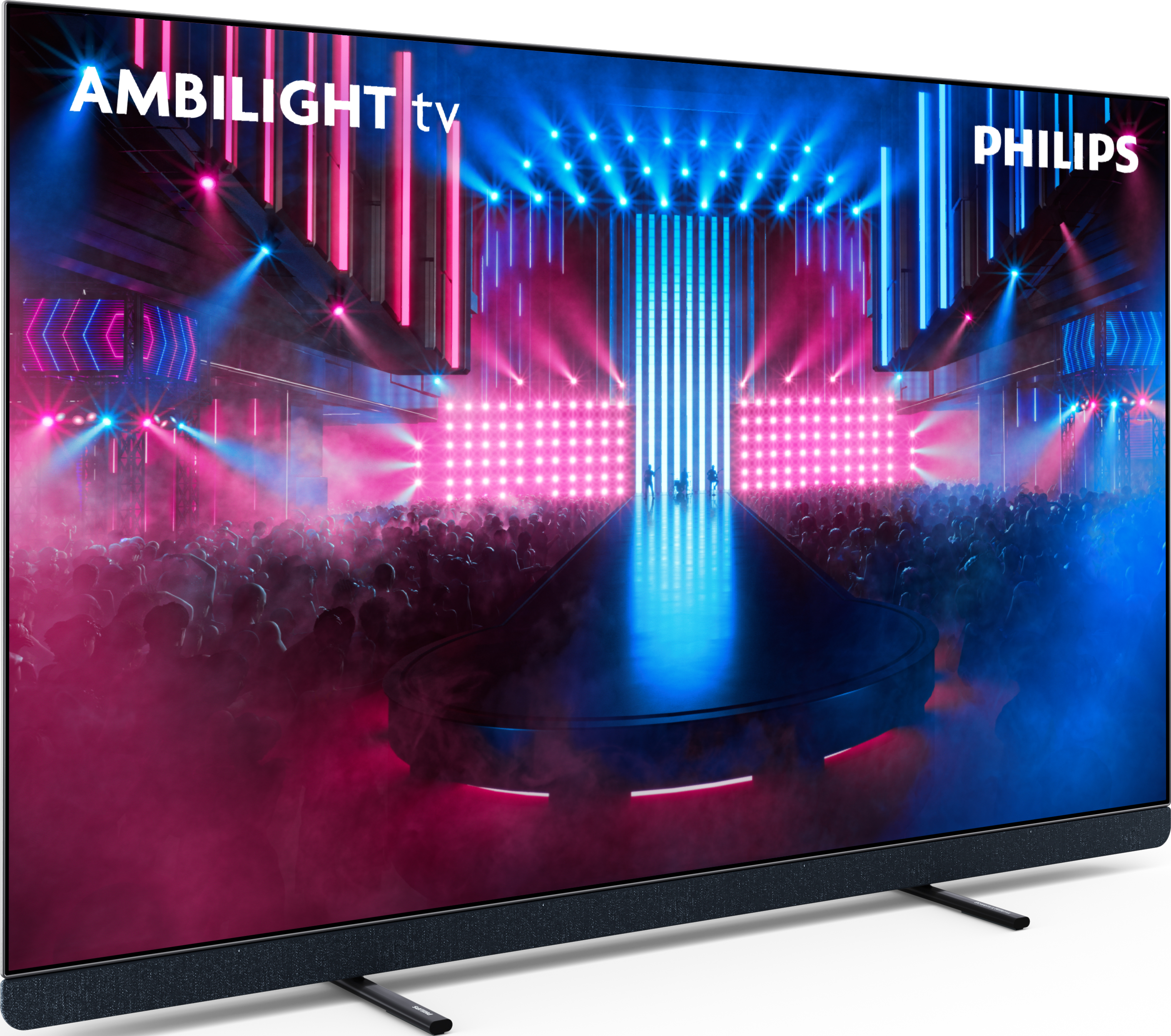 Grand téléviseur Philips montrant un spectacle. Logos Ambilight TV et Philips visibles.