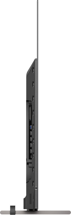 Vue latérale d'un téléviseur sombre avec ports visibles. Support fin.