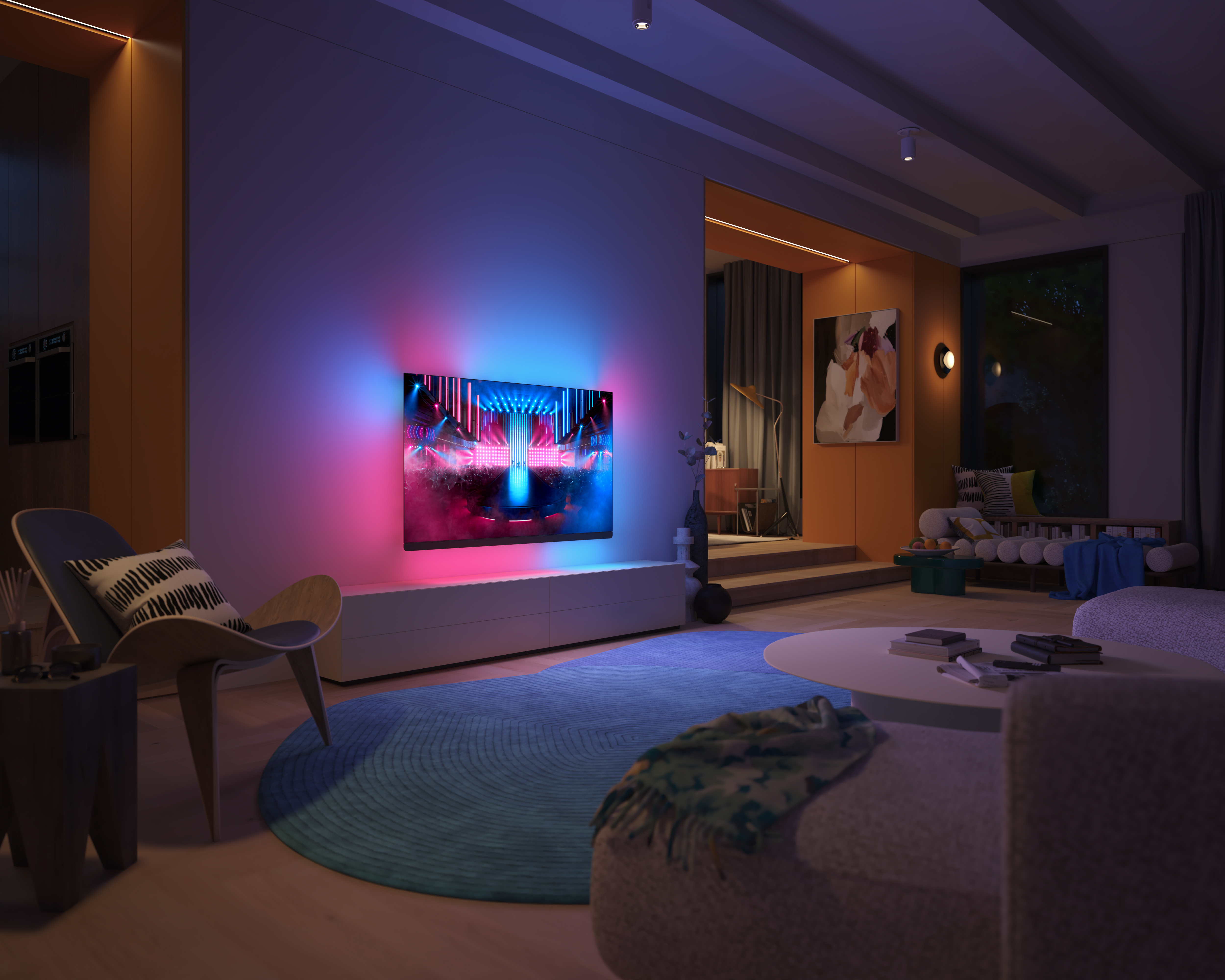 Soggiorno con una TV che mostra una scena del palco, con illuminazione ambientale blu e rosa.