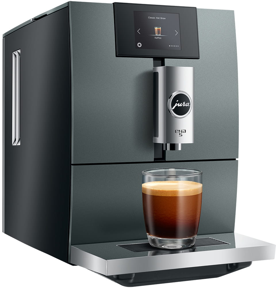 Macchina da caffè Jura ENA 5 grigio scuro con un bicchiere di caffè sotto l'erogatore.