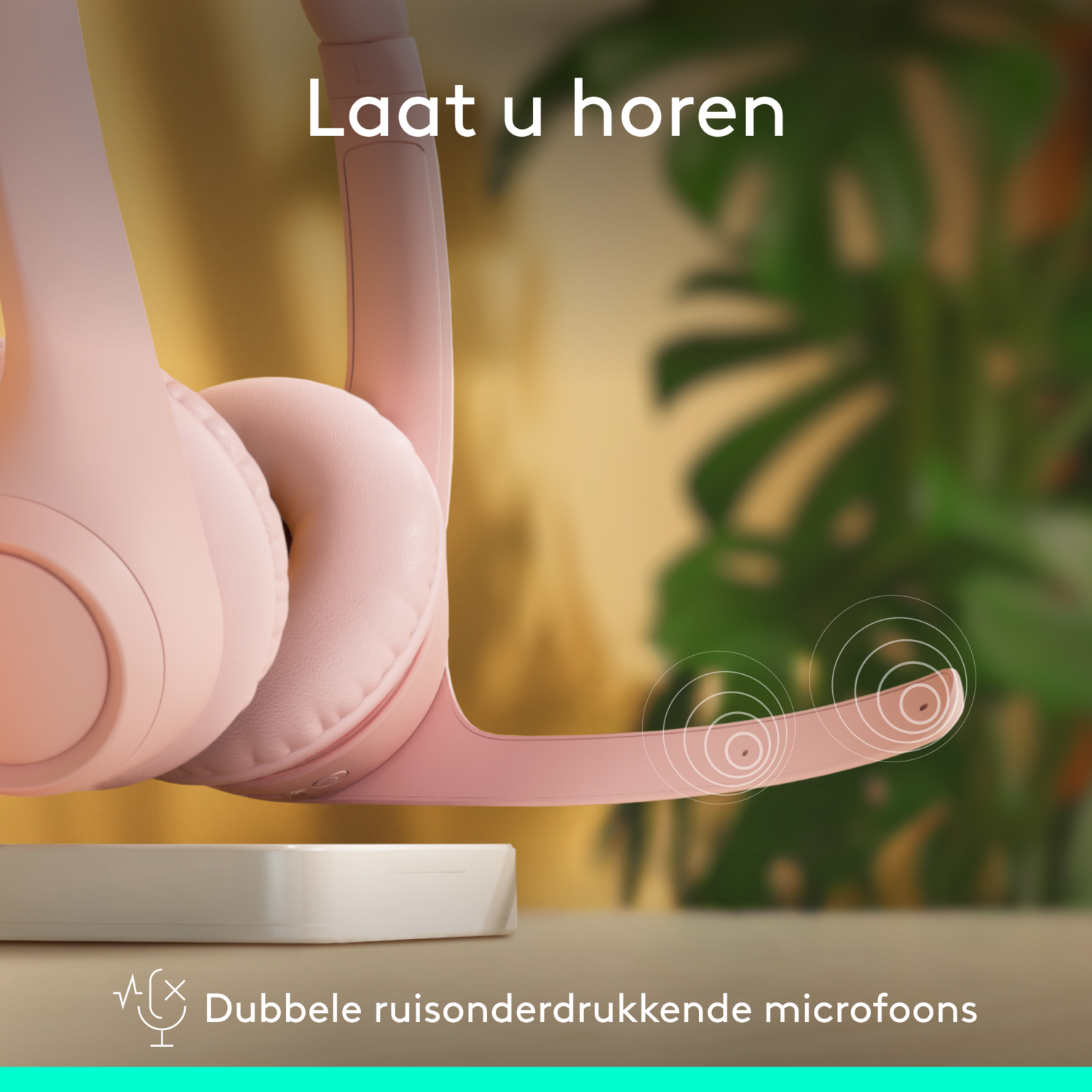 Roze hoofdtelefoon met microfoon, tekst: dubbele ruisonderdrukkende microfoons.