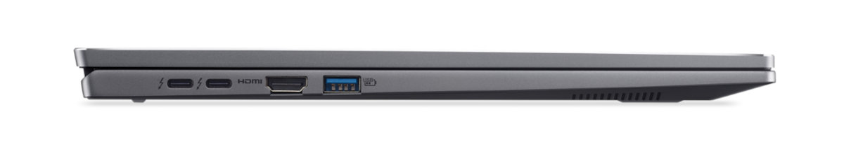 Widok z boku ciemnoszarego laptopa z różnymi portami.