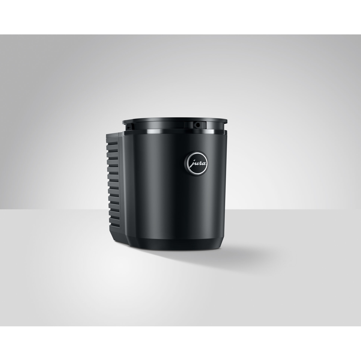 Black Jura coffee machine on a white background. The machine is cylindrical with a silver logo.