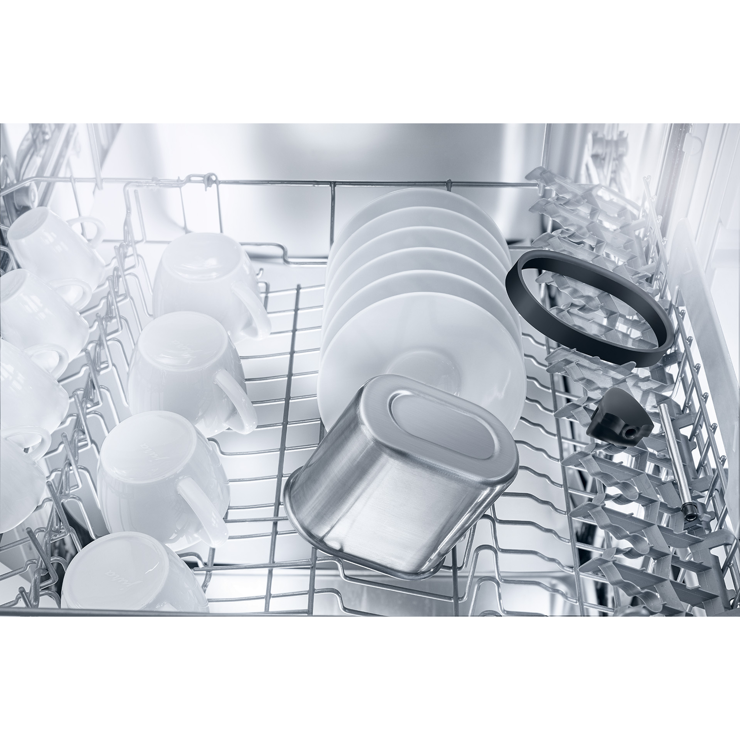 A dishwasher interior with clean white dishes and cups, and various utensils.