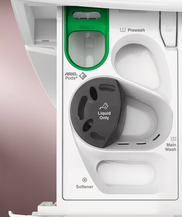Mosógép mosószer rekesze. Zöld max. töltővonal az Ariel Pods-hoz. 'Csak folyékony' felirat.