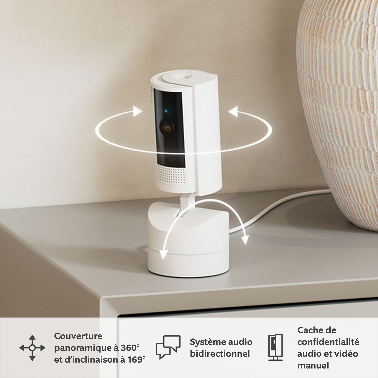 Une caméra de sécurité blanche sur un support. Flèches indiquent rotation à 360° et inclinaison à 169°.