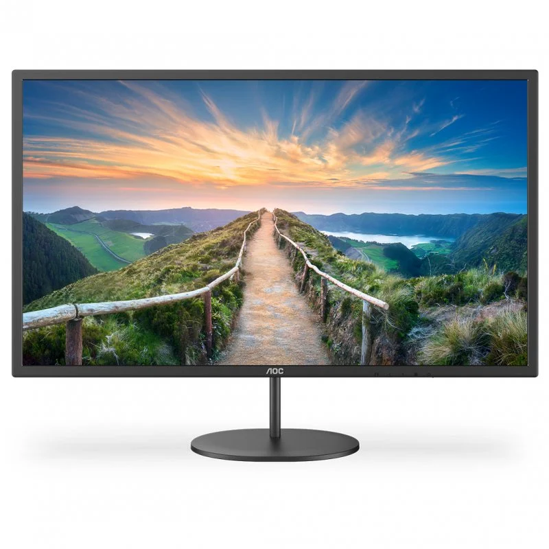Monitor de ordenador mostrando un paisaje con un camino y atardecer.