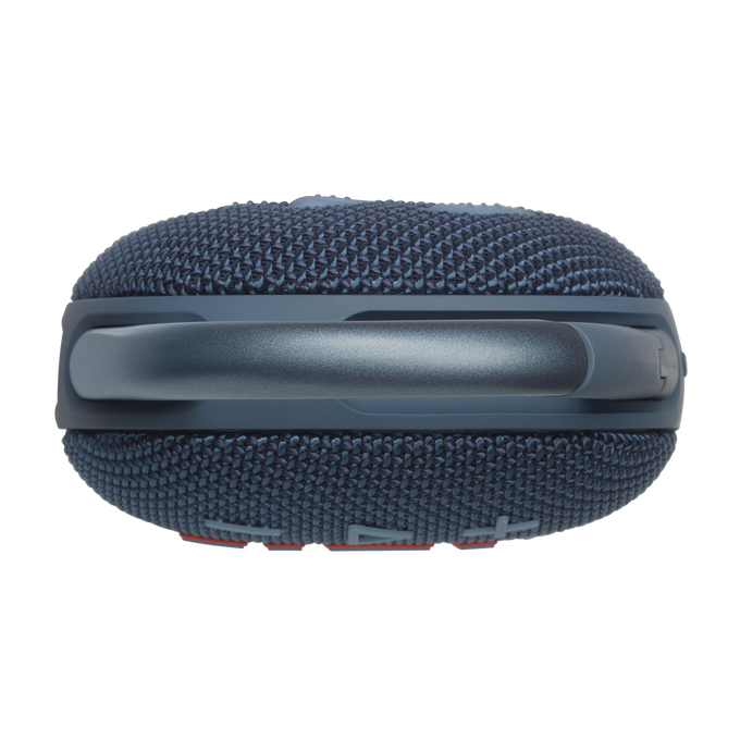 Altavoz portátil redondo, azul y gris con asa, sobre una superficie negra.