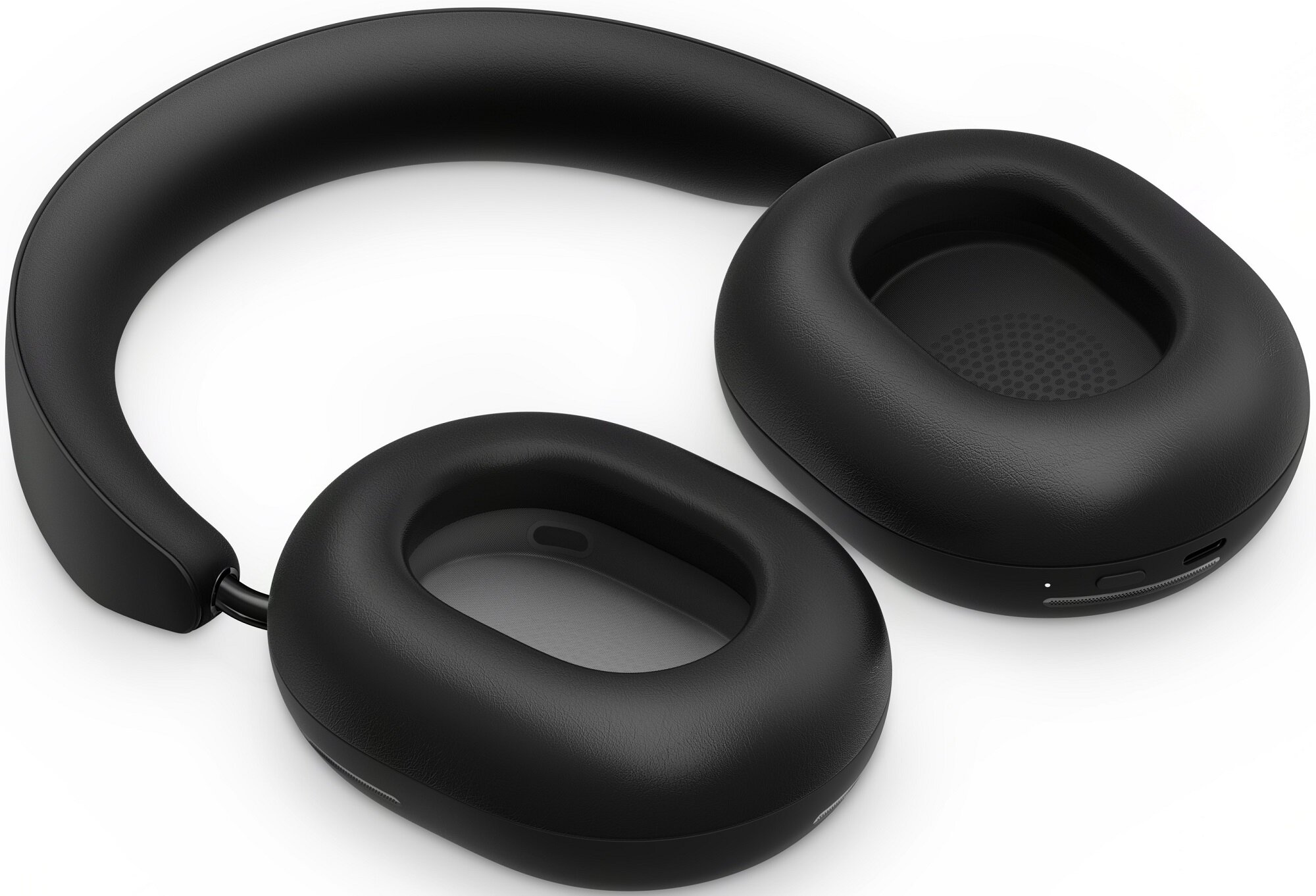 Czarne słuchawki z nausznikami, pałąkiem i wyściółką, na białym tle.
