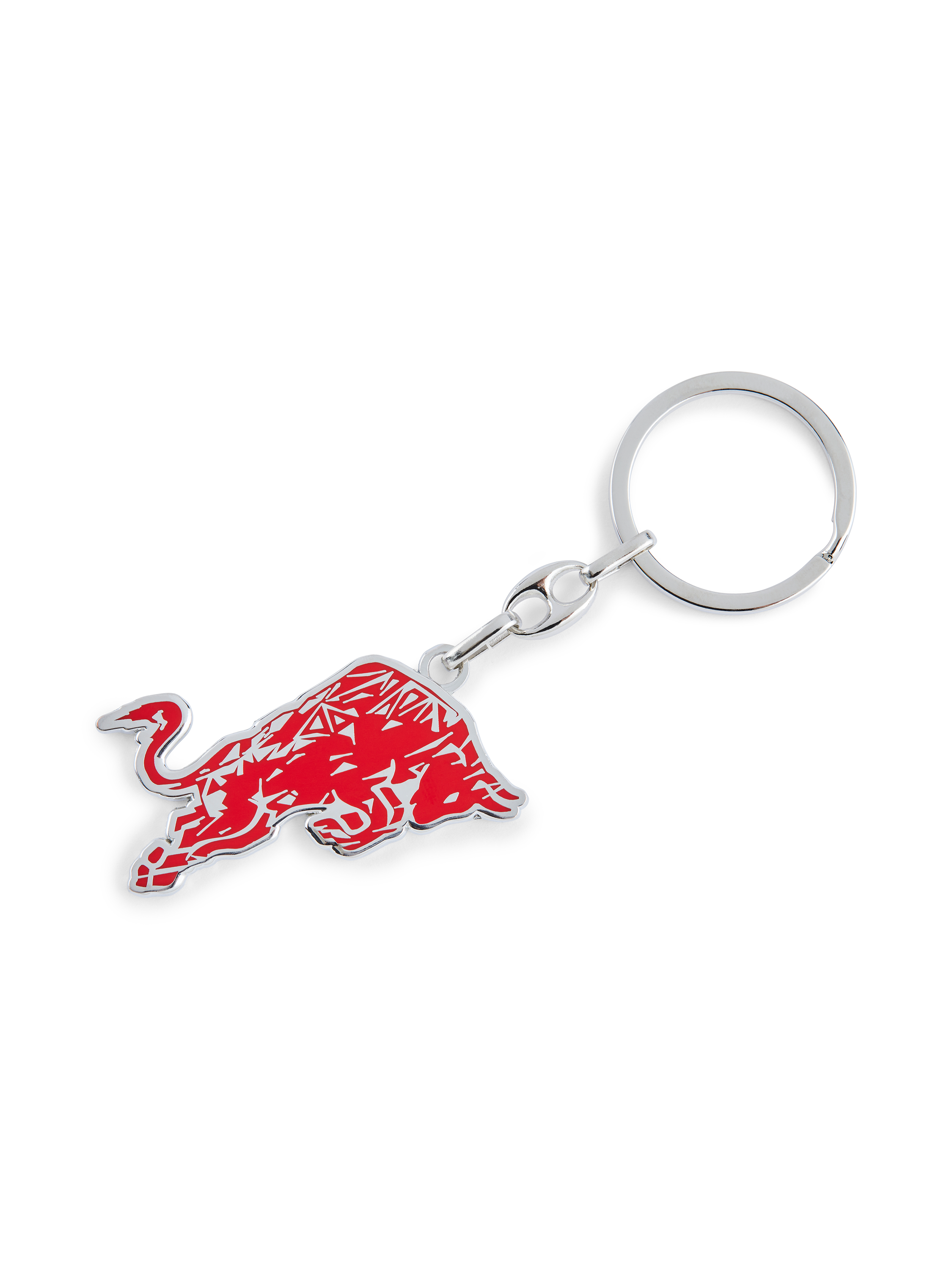 Ein Red Bull Schlüsselanhänger mit einem roten Bullenlogo. Es ist auf schwarzem Hintergrund.