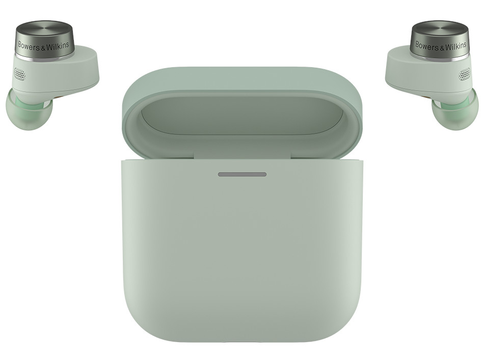 Dwa słuchawki i etui ładujące. Słuchawki są jasnozielone ze srebrnymi detalami.