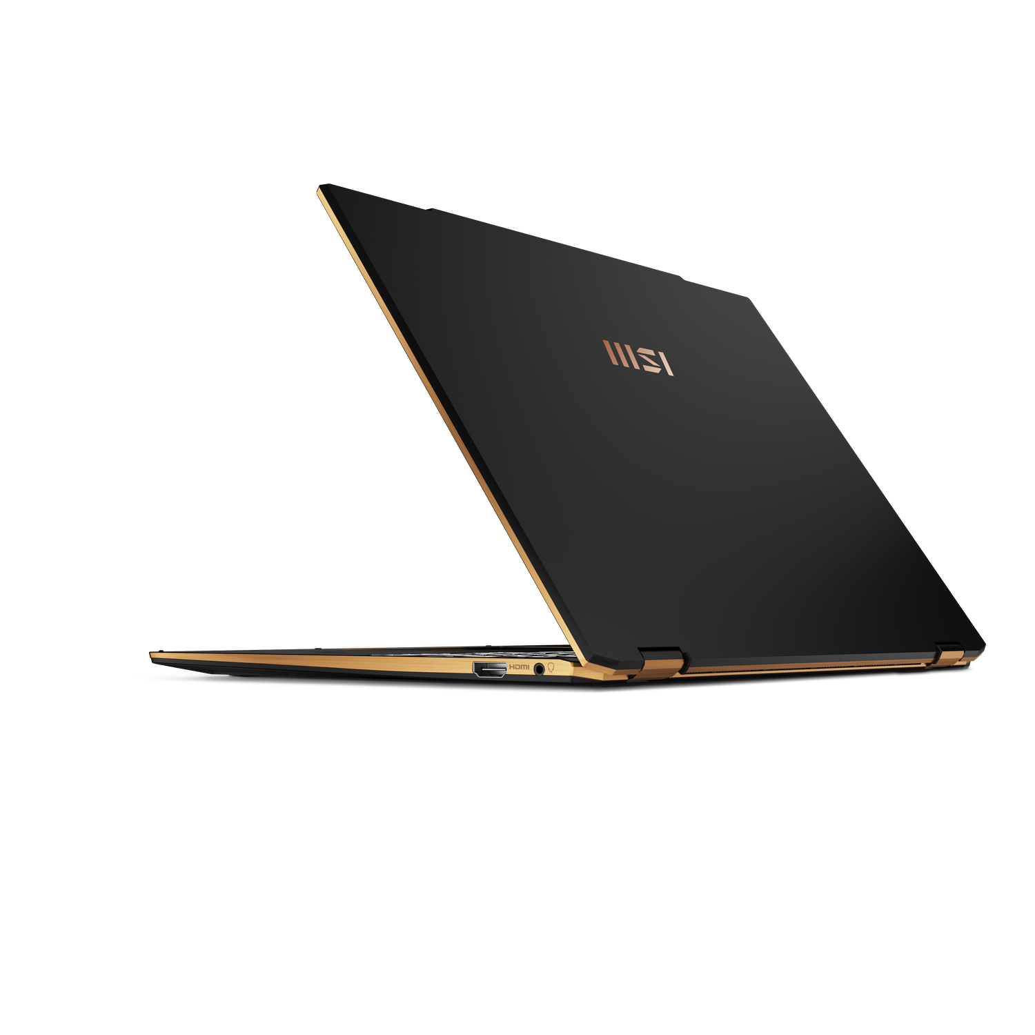 Una computadora portátil negra está abierta, mostrando la parte trasera. Tiene detalles dorados y un logotipo brillante.