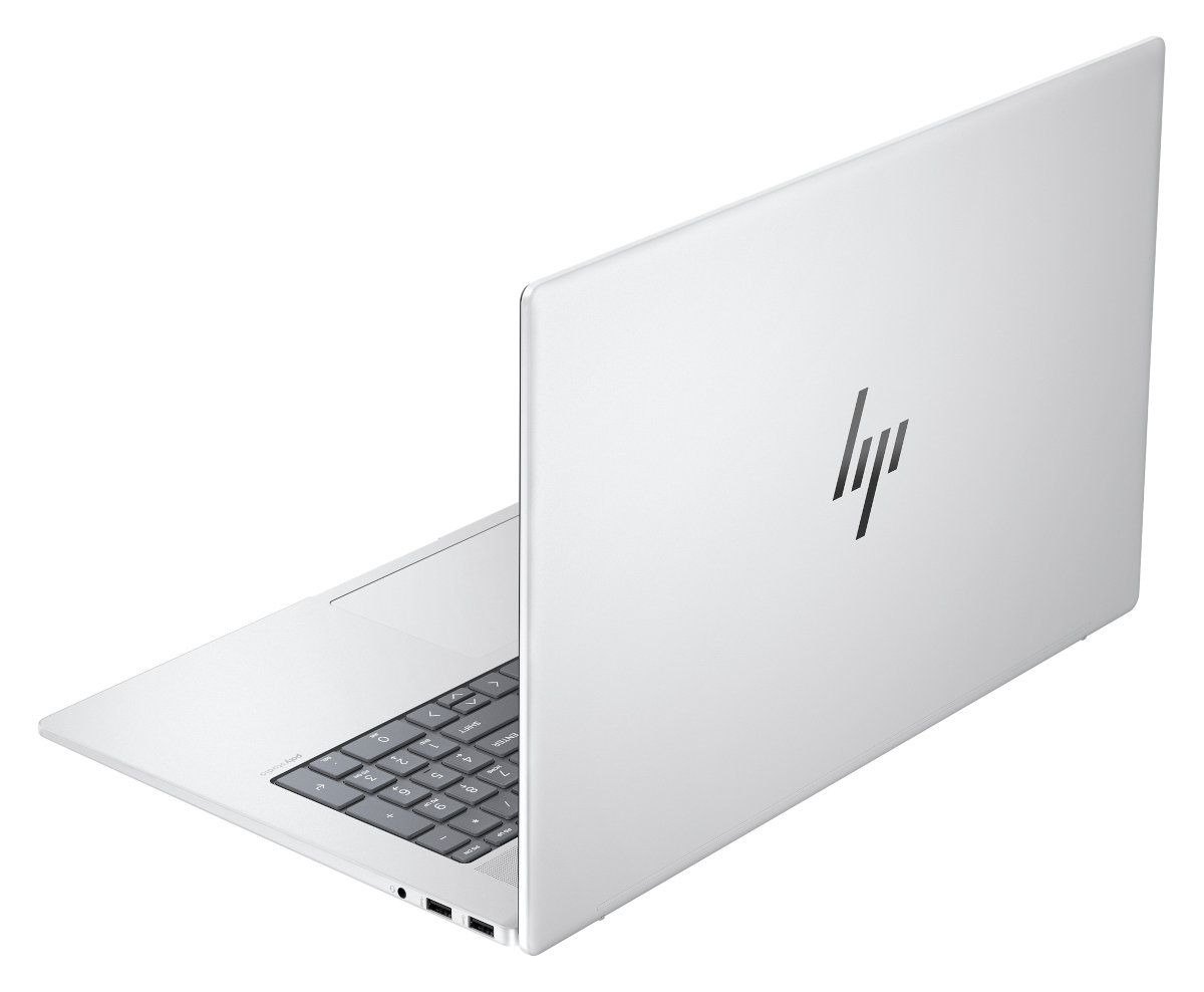 Biały laptop na białym tle. Pokrywa jest otwarta.