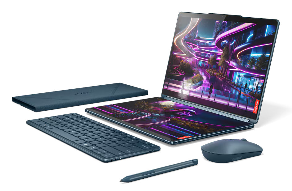 Laptop Lenovo Yoga z akcesoriami: klawiatura, mysz, pióro i etui. Ekran wyświetla futurystyczne miasto.