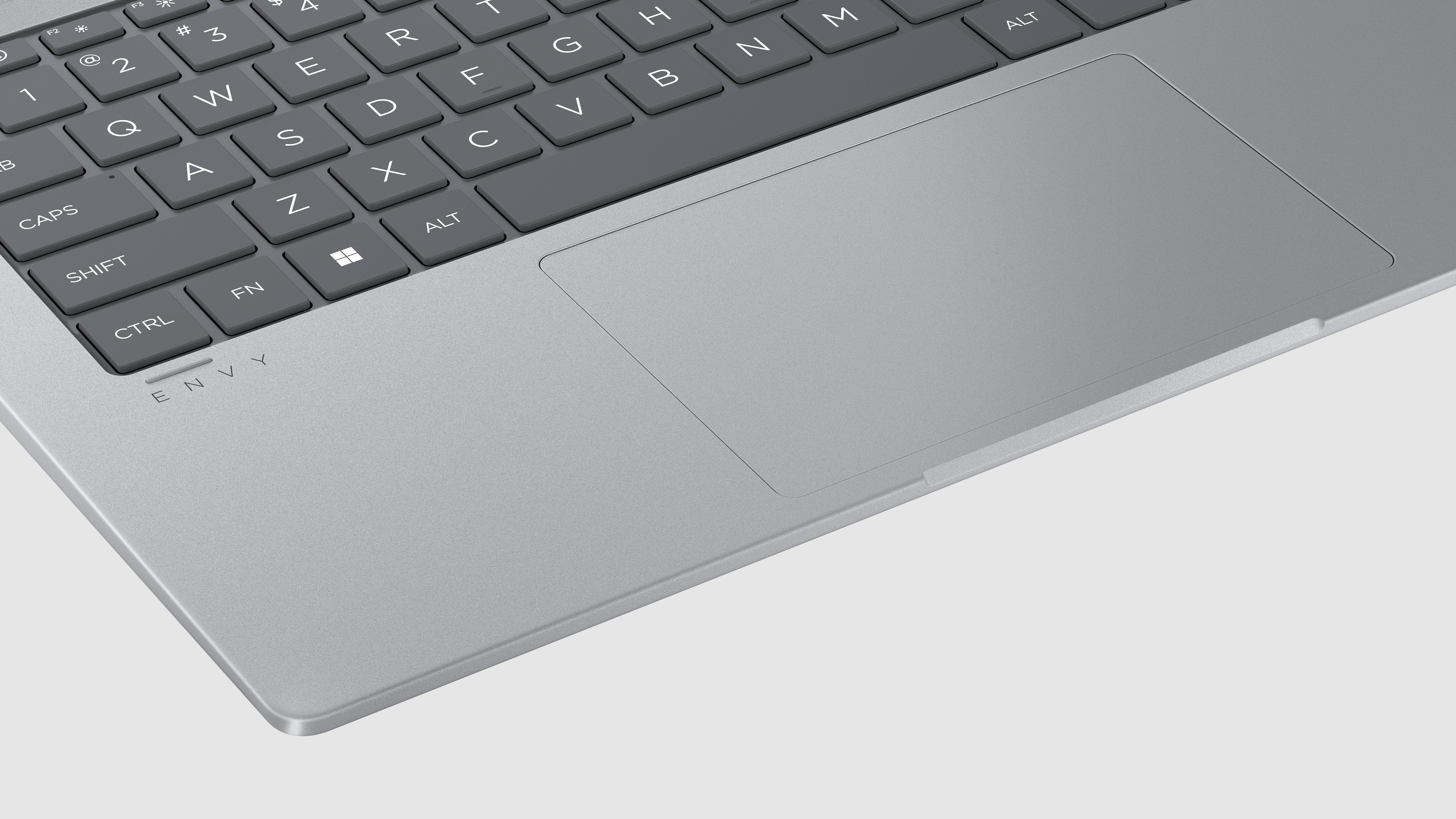 Laptop-Tastatur und Touchpad, mit dem ENVY-Logo.