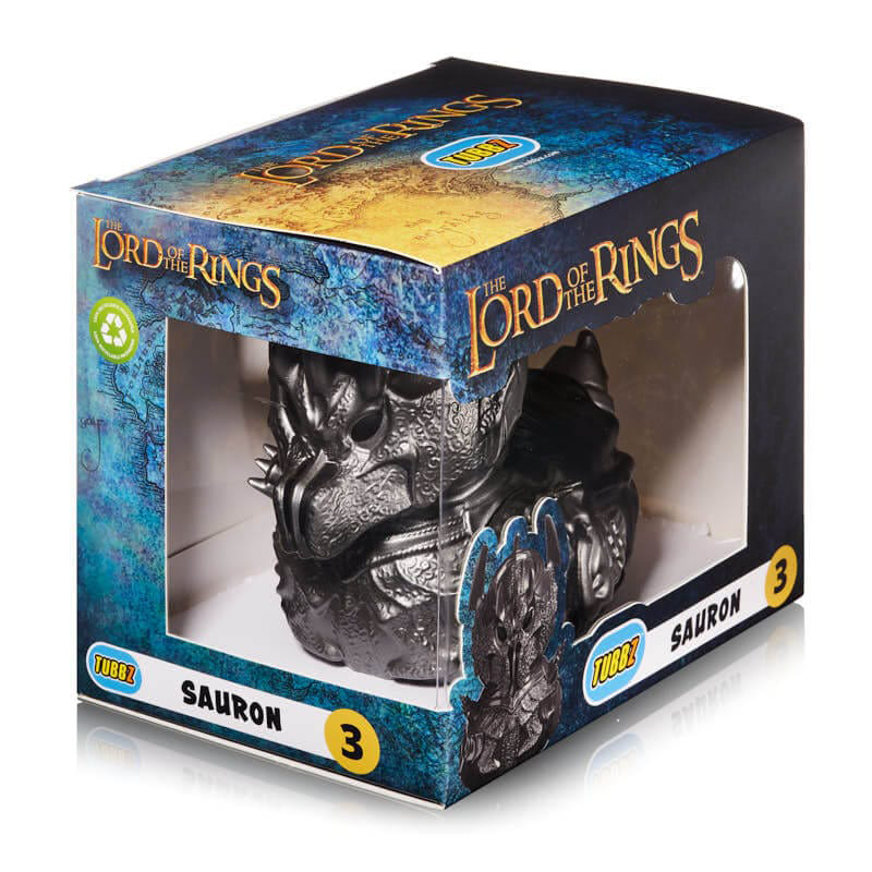 Egy Sauron figura a Gyűrűk Ura témájú dobozban.