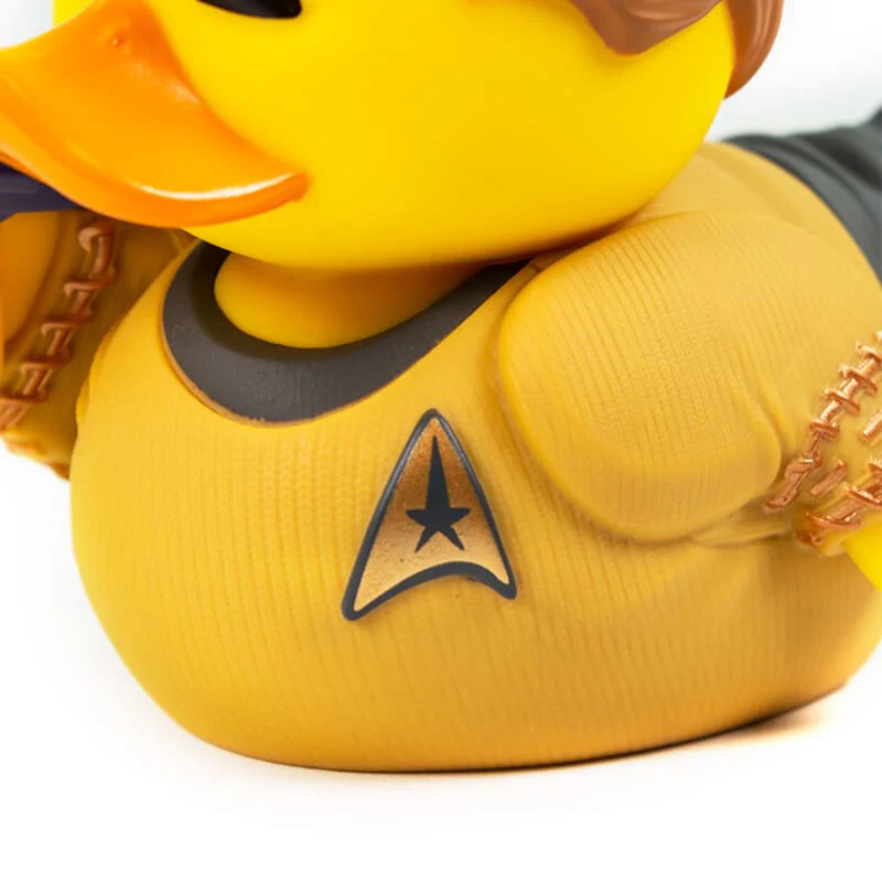 Sárga gumikacsa Star Trek egyenruhában, Starfleet parancsnoki jelvénnyel.