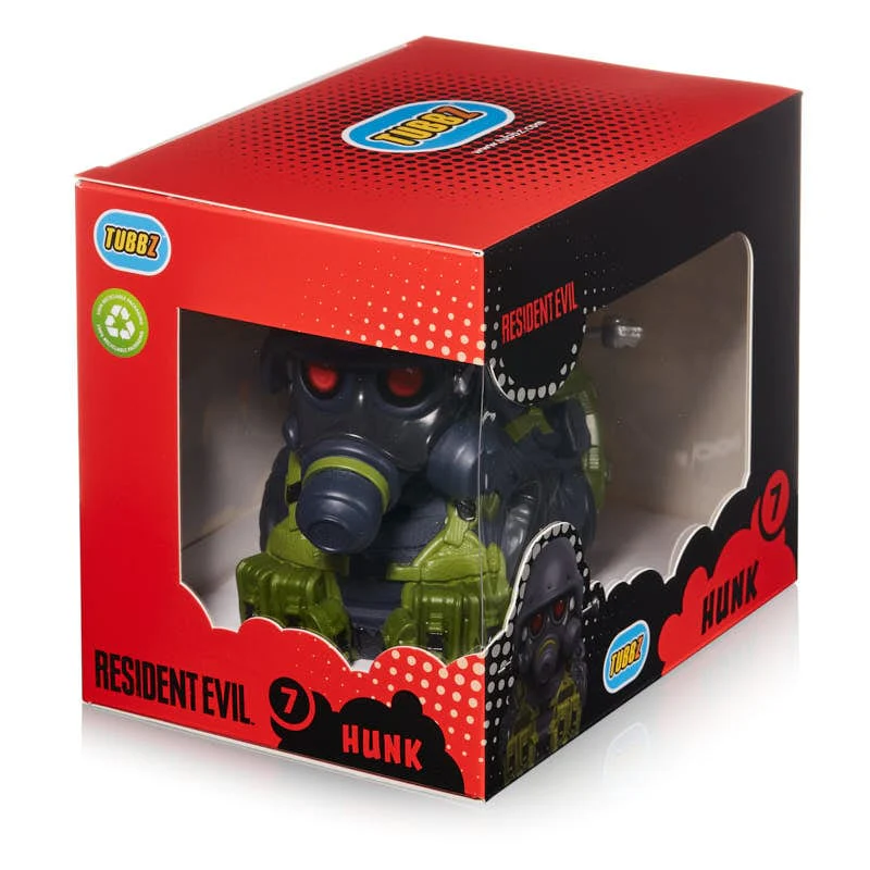 Hunk figura a Resident Evil-ből, piros-fekete dobozban.