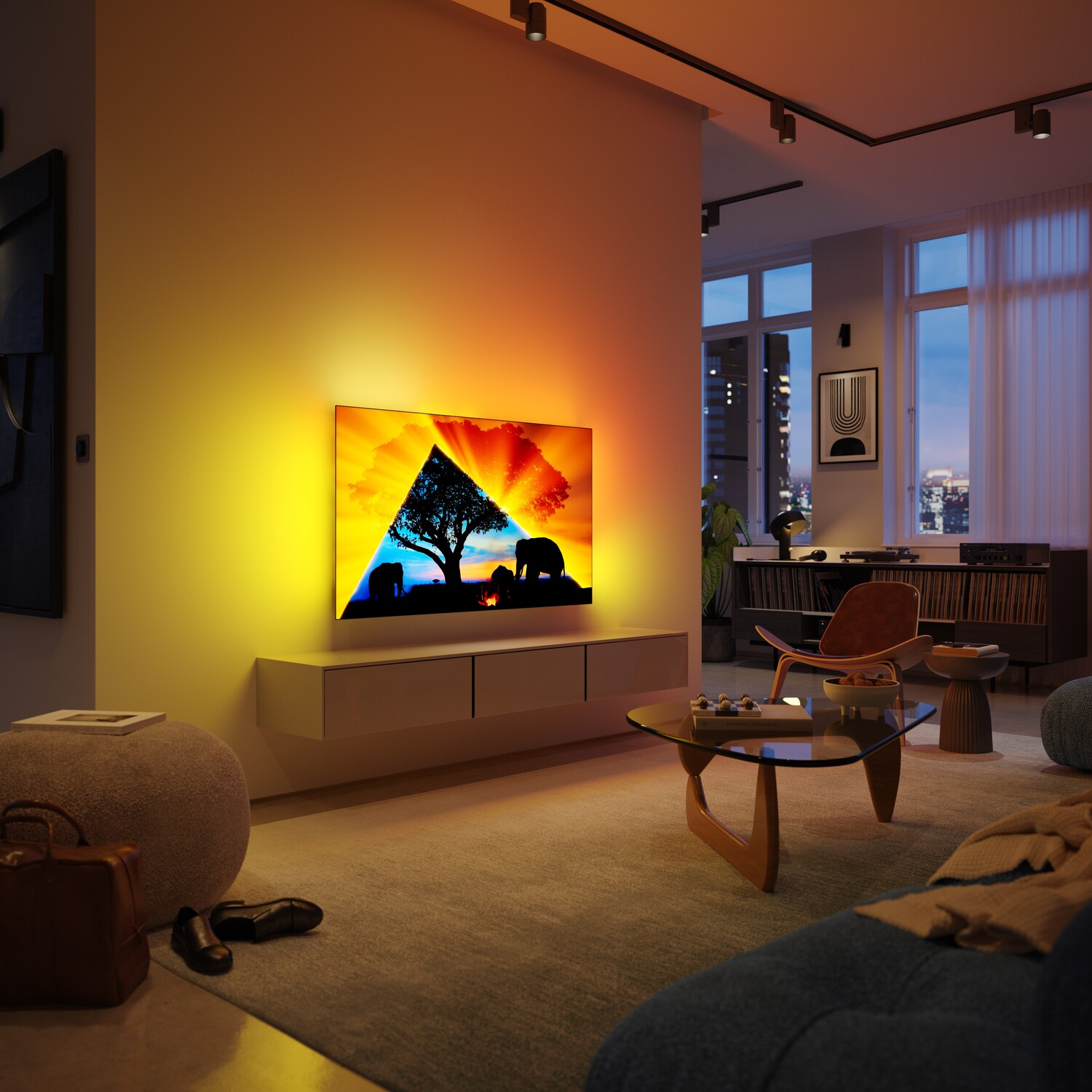 Woonkamer met tv en kleurrijke omgevingsverlichting aan de muur.