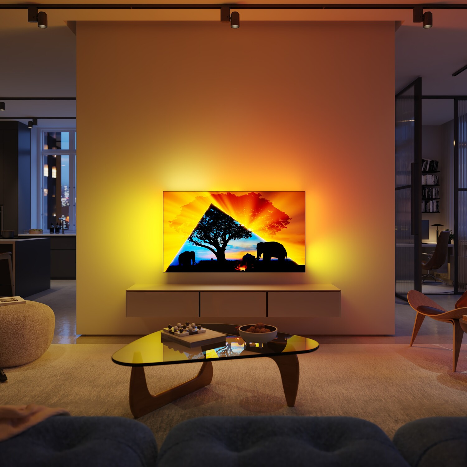 Een tv-scherm met een landschapsbeeld, met lichten die de achtergrond verlichten.