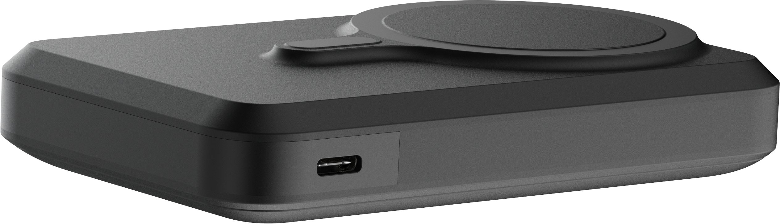 Ein schwarzes Ladepad mit kreisförmiger Ladefläche und USB-C-Anschluss. Das Gerät steht auf weißem Hintergrund.
