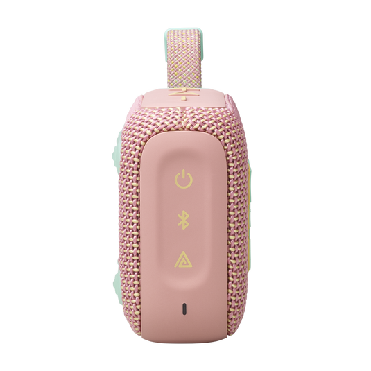 Pembe ve gri taşınabilir hoparlör, düğmeler, yan görünüm.