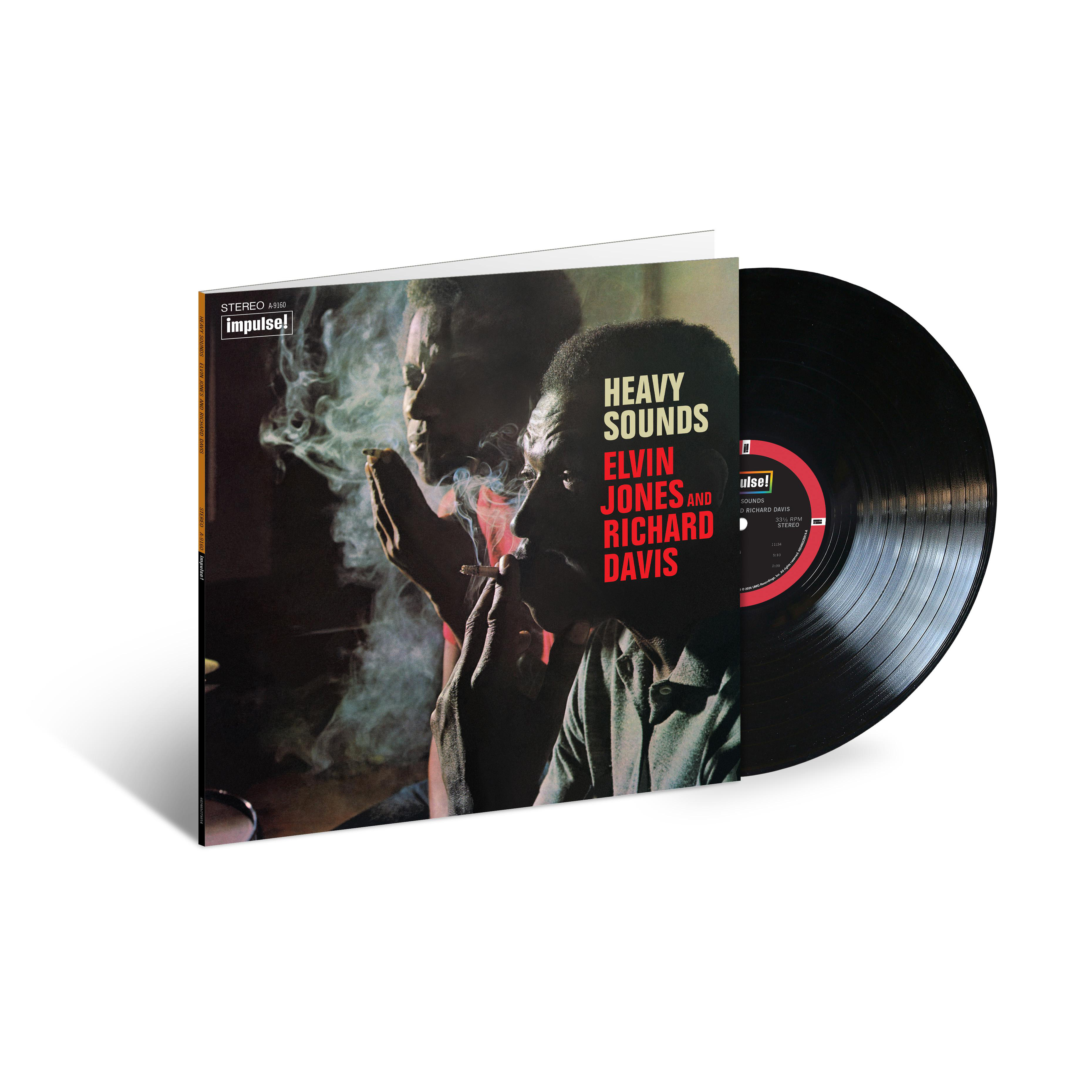 Vinyl-Schallplattenhülle. Zwei rauchende Männer und Albumtitel. Schwarze Platte liegt neben der Hülle.