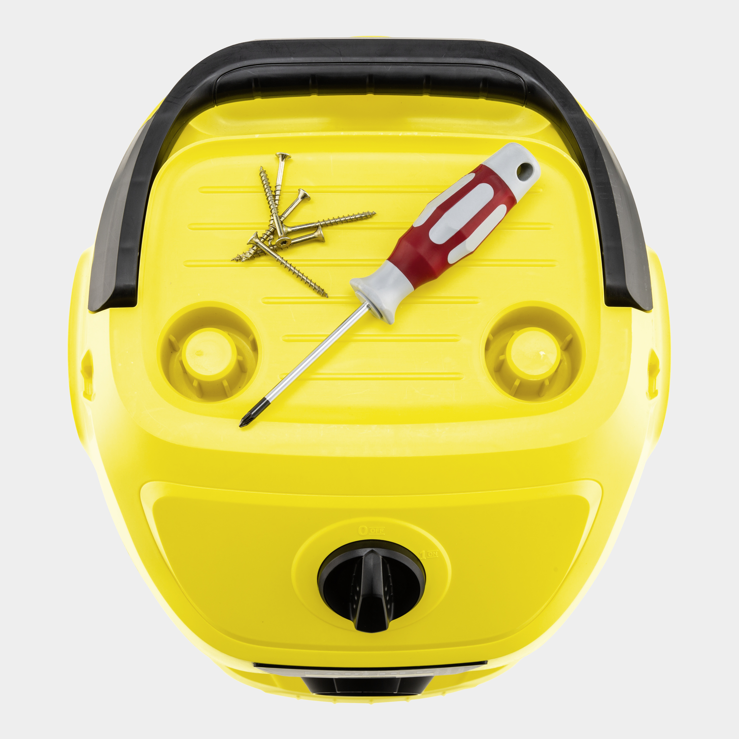 A yellow vacuum cleaner with a screwdriver and screws.