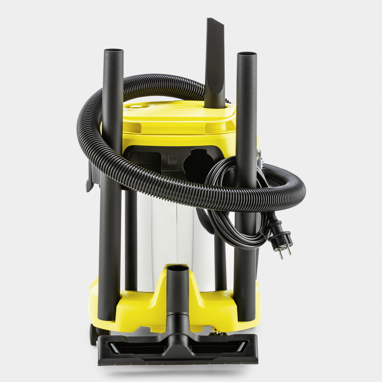 Yellow and black vacuum cleaner with hose and attachments.