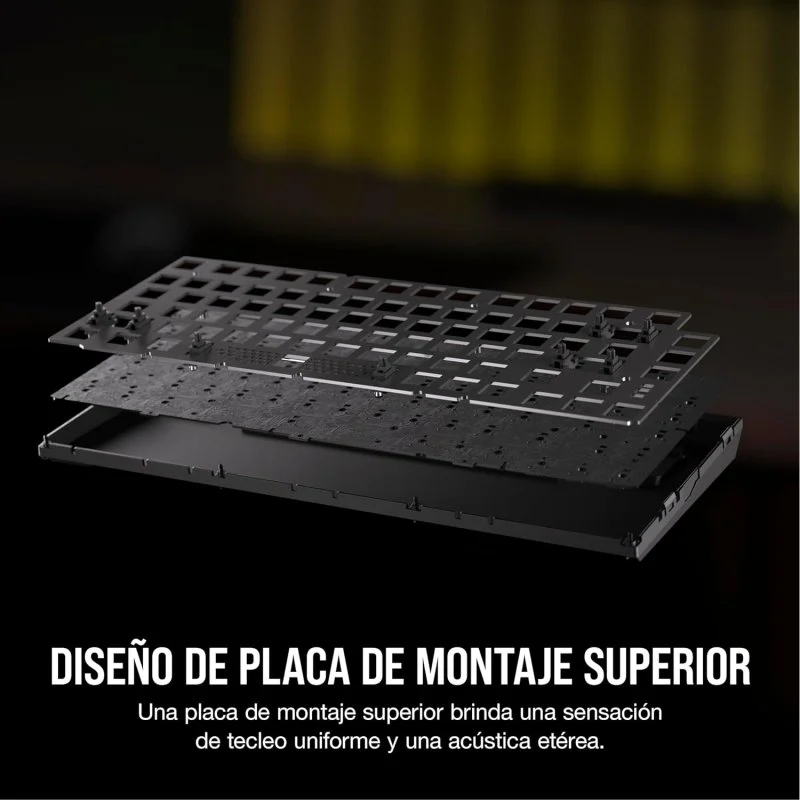 Una vista explosionada de un teclado negro con las piezas separadas para mostrar las capas.