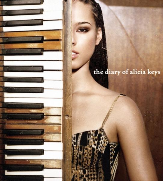 Alicia Keys auf dem Cover von 'The Diary of Alicia Keys', die Hälfte ihres Gesichts ist neben einer Klaviatur zu sehen.