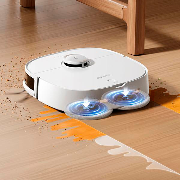 Ein weißer Roboterstaubsauger, der einen Holzboden mit zwei rotierenden Wischmopps reinigt.