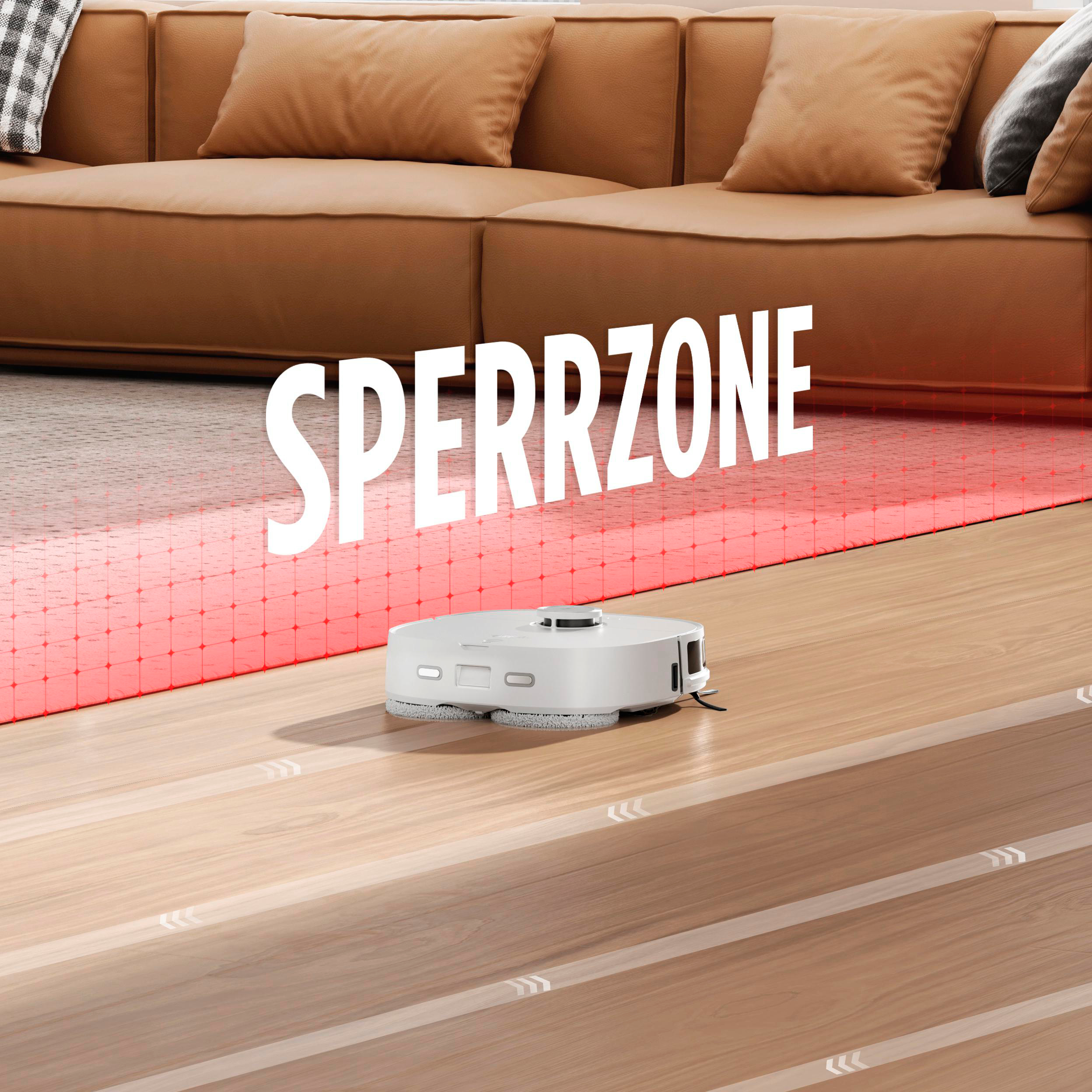 Ein Roboter-Staubsauger reinigt einen Holzboden. Der Boden hat einen roten Sperrzone-Bereich.