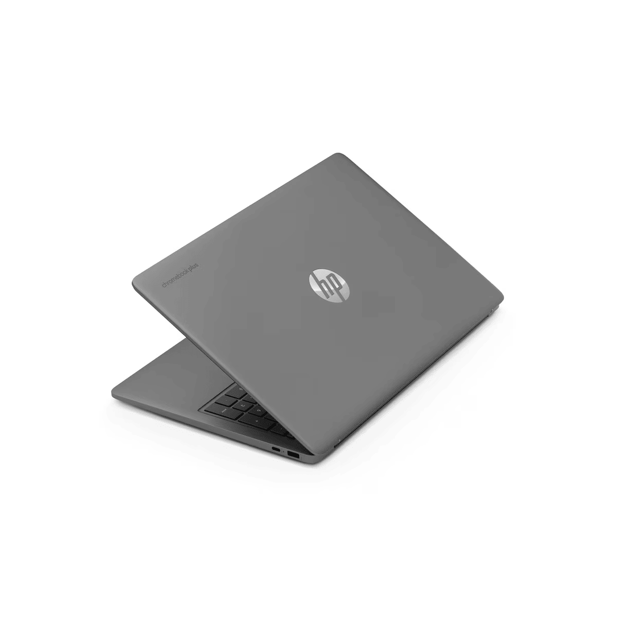 Un portátil gris, ligeramente abierto, con el logotipo de HP en la parte superior. El fondo es blanco.