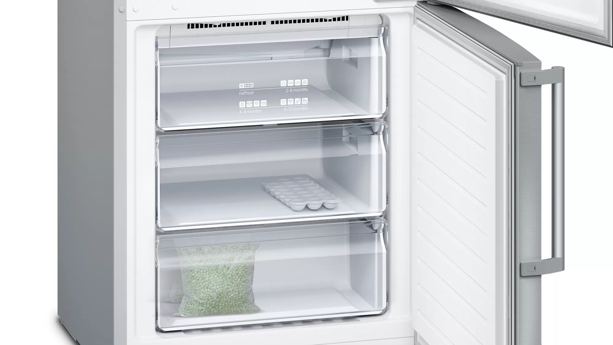 Otwarta lodówka z trzema przezroczystymi szufladami: dwie pełne, jedna z tacką na kostki lodu.