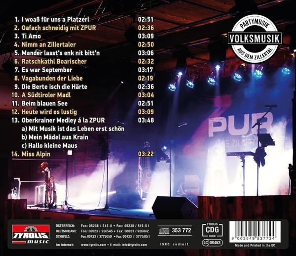 CD-Rückseite mit Titelliste und Live-Bühnenfoto. Band auf der Bühne mit Lichtern und Instrumenten.