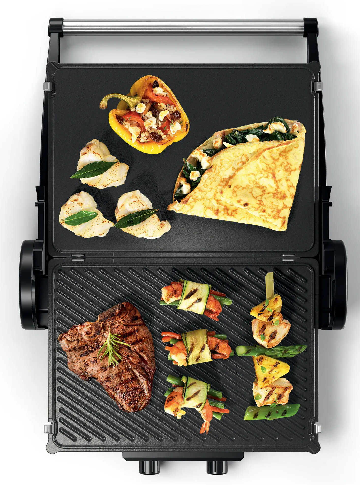 Grill z różnymi grillowanymi potrawami. Zawiera stek, warzywa i nadziewane naleśniki.