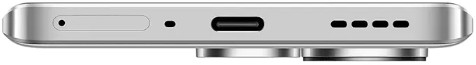Widok z boku srebrnego telefonu z wypukłością kamery i portami.