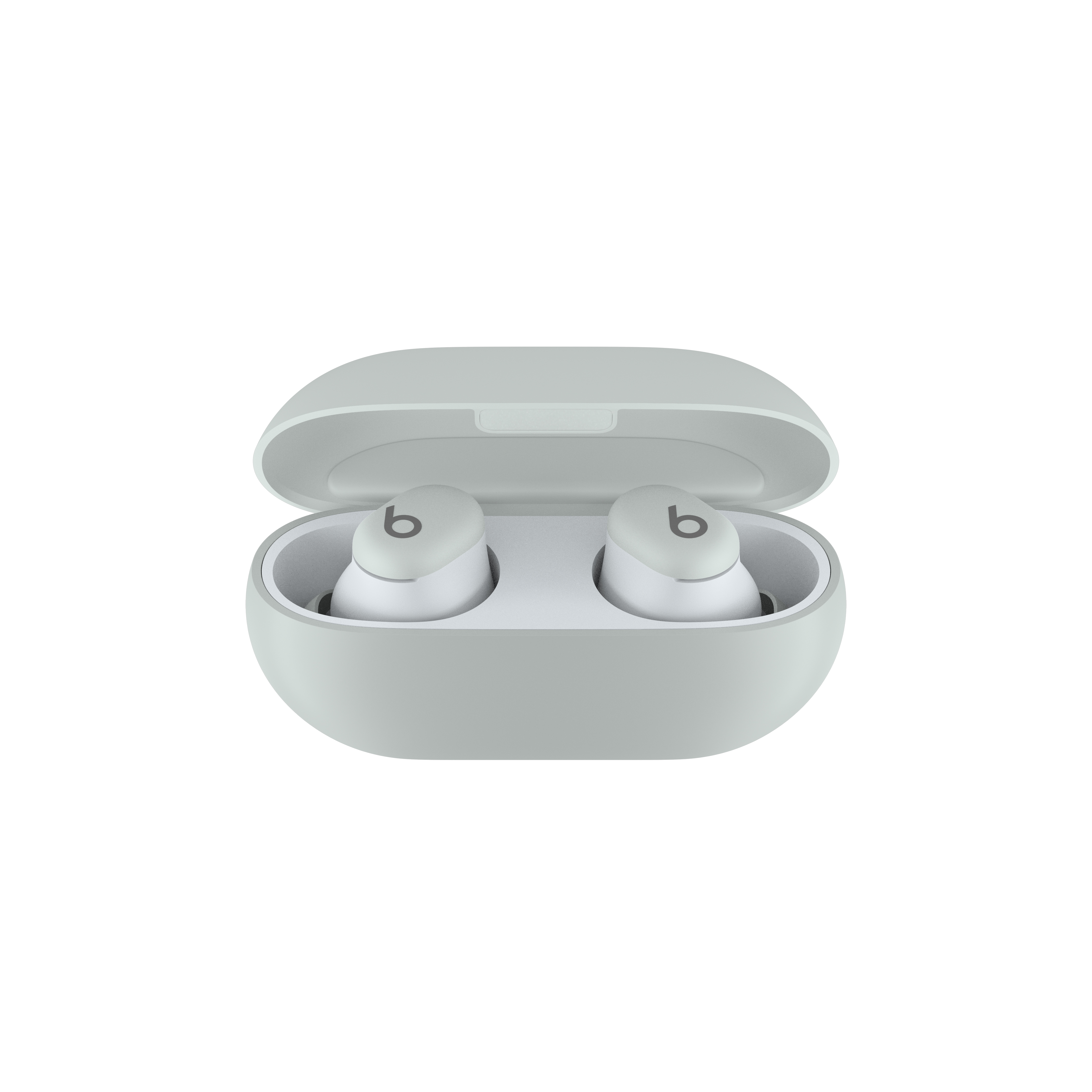 Un par de auriculares Beats blancos dentro de su estuche de carga gris claro.
