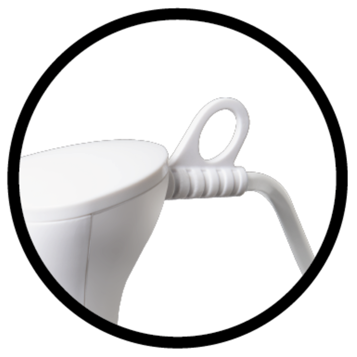 Close-up of a white kettle handle with a loop, in a black circle.