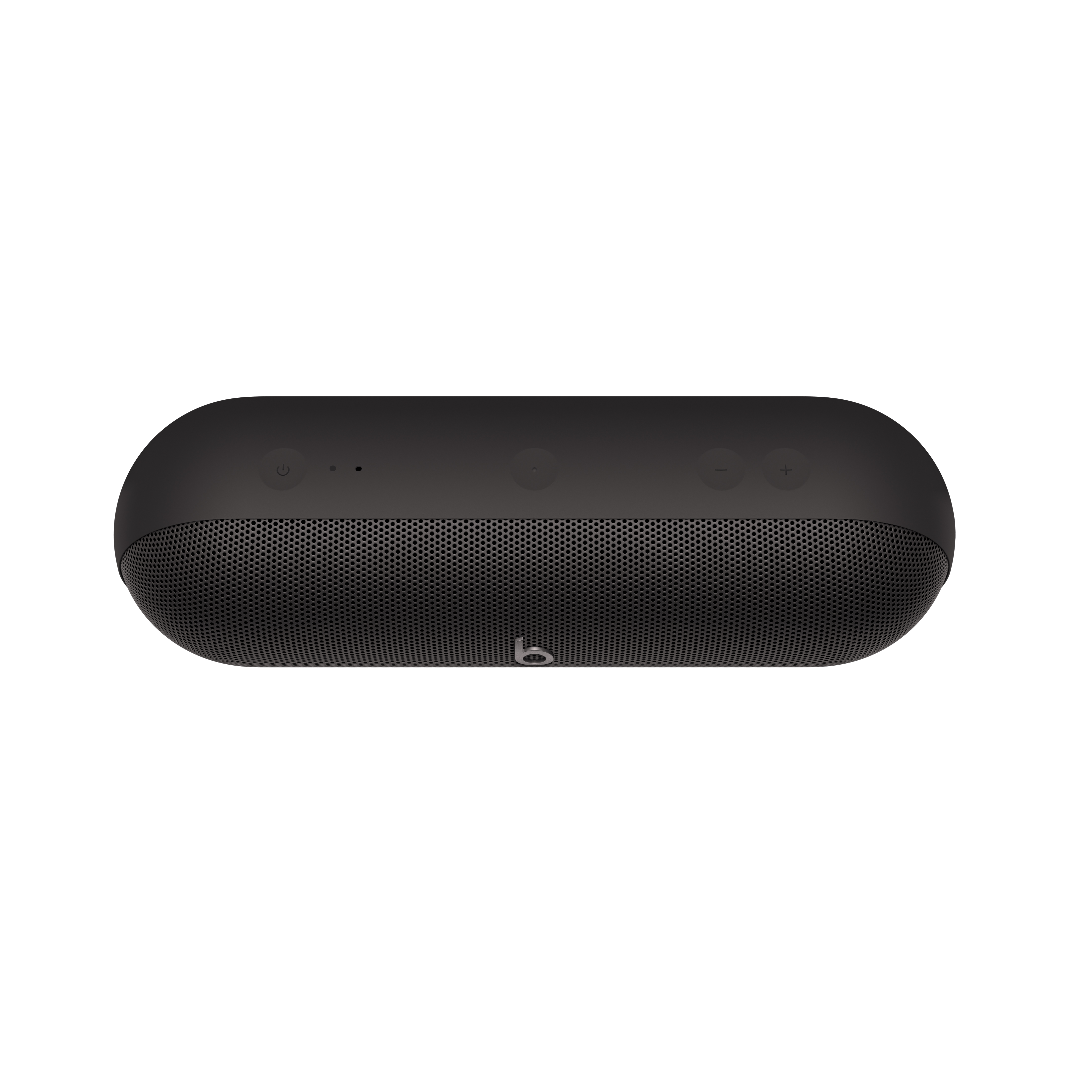 Un altavoz Beats Pill+ negro, vista superior, sobre fondo blanco.