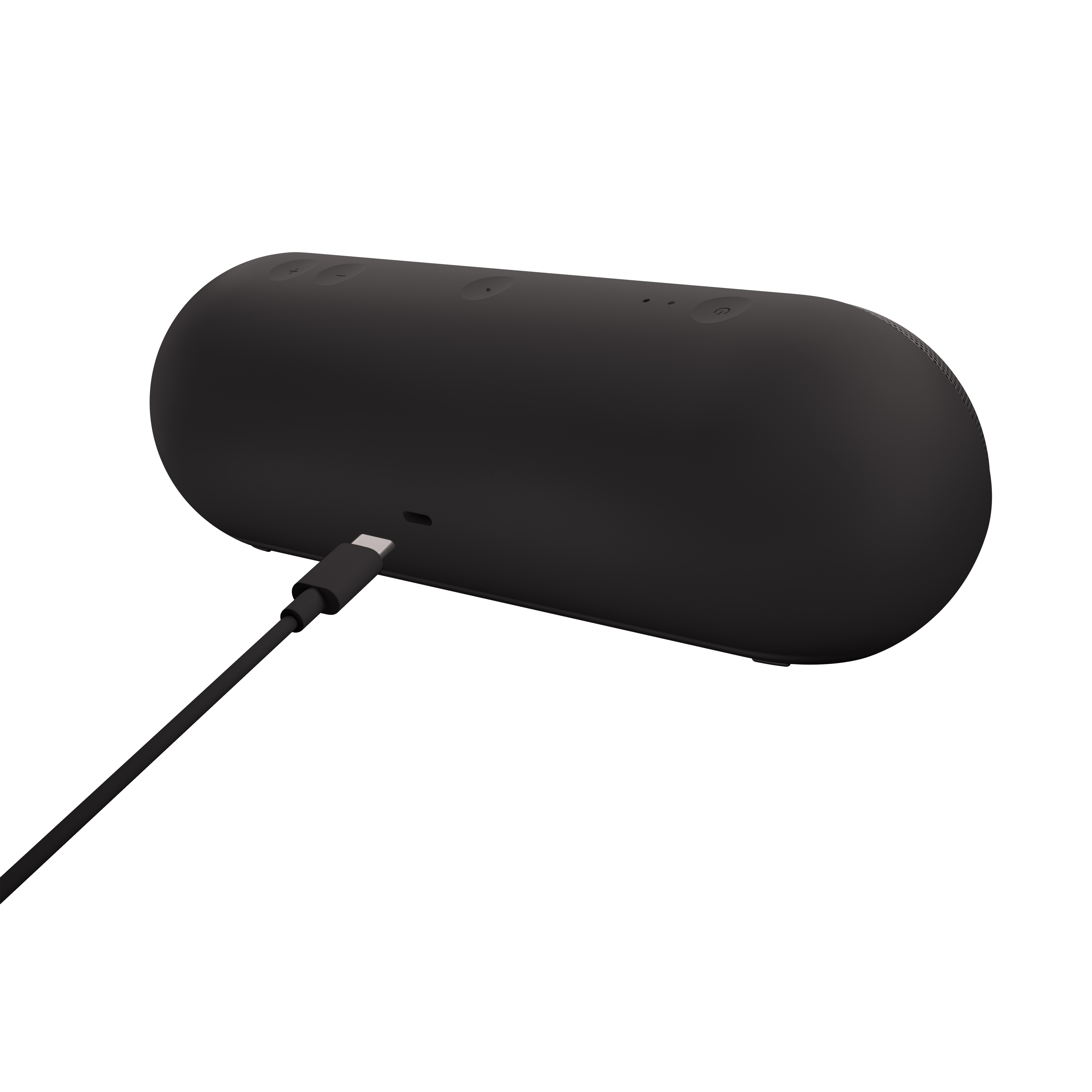 Altavoz negro con un cable enchufado. El altavoz tiene forma ovalada.