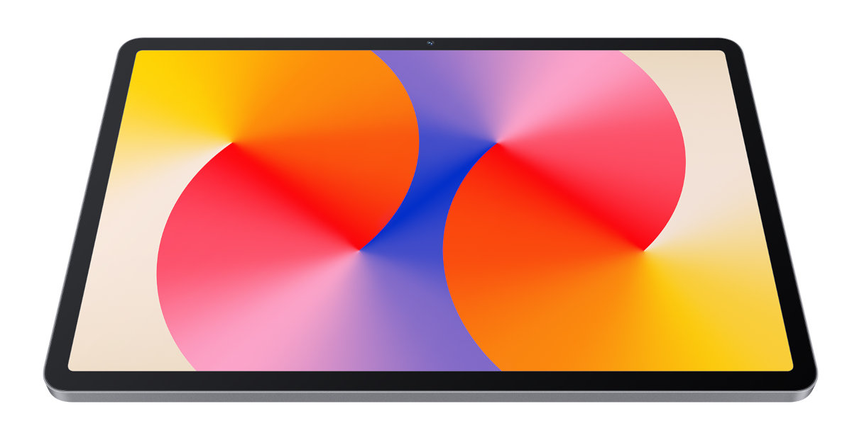 Tablet na białej powierzchni, żywy, kolorowy wyświetlacz. Ekran pokazuje gradient kolorów.