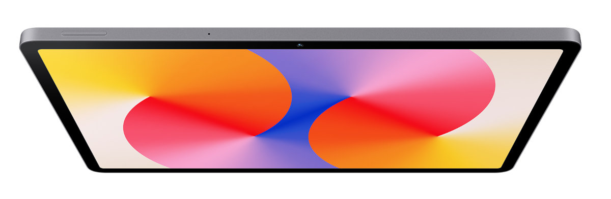 Tablet wyświetlający kolorową sztukę abstrakcyjną, widok z góry, na białym tle.