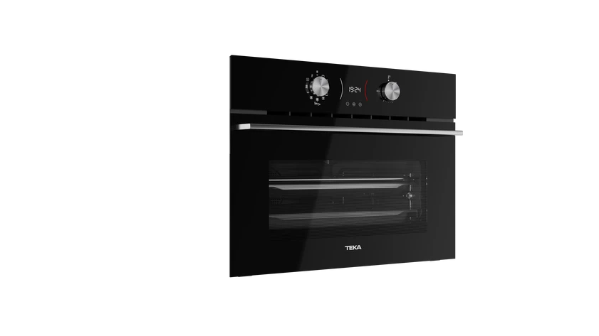 Horno negro, abierto, con el logotipo de TEKA, sobre un fondo negro.